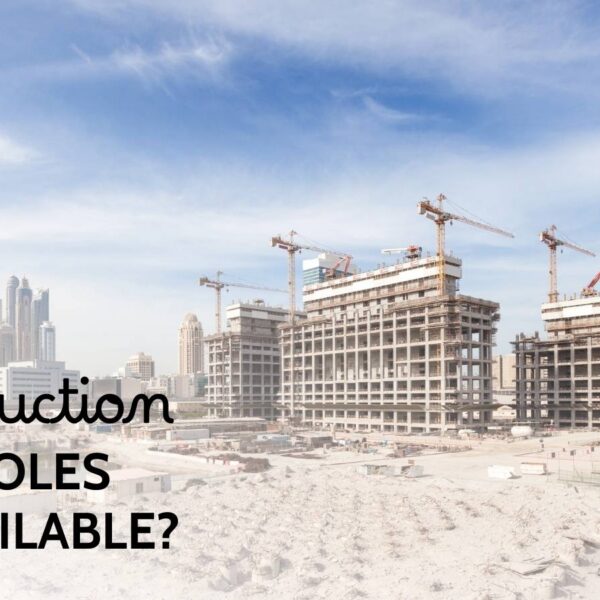 Large construction site in Dubai with multiple tower cranes and skyscrapers behind, captioned construction, what roles are available